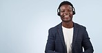 Happy black man, call center and advertising in customer service or marketing against a studio background. Portrait of African businessman, consultant or agent showing information or advice on mockup