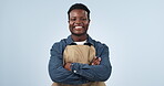 Happy, black man and portrait with arms crossed in small business, cafe or blue background in studio. Entrepreneur, face or confident for startup, restaurant or working in service industry with smile