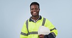 Happy, smile and face of construction worker in a studio with positive, good and confident attitude. Laugh, portrait and professional African male engineer with hardhat isolated by blue background.