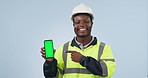 Happy black man, engineer and phone green screen in marketing against a studio background. Portrait of African male person, architect or contractor pointing to mobile smartphone app display or mockup