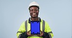 Engineering man, tablet green screen and industrial presentation of renovation, architecture or design in studio. Face of construction worker or african person on digital mockup and a blue background