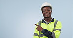 Architect, pointing to space and black man advertising in studio isolated on a blue background mockup. Portrait, hand and happy engineer marketing construction, building promotion or commercial offer