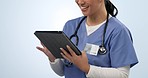 Happy woman, hands and tablet of doctor in research or communication against a studio background. Closeup of female person or medical nurse smile on technology in Telehealth, networking or web search