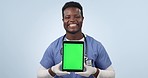 Black man, doctor and tablet with green screen in marketing against a studio background. Portrait of happy African male person or medical healthcare surgeon showing technology app display or mockup