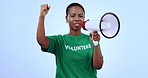 Woman, volunteer and megaphone for protest, support and call to action or accountability and join us in studio. African person speaking, volunteering and voice for change or fight on blue background