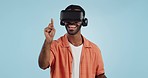 Man, virtual reality and glasses in studio with hand, click and swipe with smile for metaverse by blue background. Person, AR vision and futuristic game with 3D user experience, cyber ui and esports