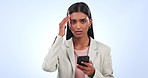 Business, stress and woman with a headache, cellphone and mistake with an error on a blue studio background. Person, employee and entrepreneur with a migraine, burnout and anxiety with smartphone