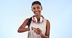 Fitness, face and woman with watch in studio for checking time or pulse for cardio workout. Wellness, sports and portrait of Indian athlete for running exercise or training by blue background.