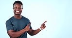 Workout studio, happy black man and point at advertising direction, gym logo design or sports cardio info, service or sale. Portrait, mockup space and African athlete announcement on blue background