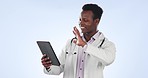 Video call, tablet and doctor with greeting and telehealth for medical and healthcare work in studio. Black man, digital work and wave with technology for hospital and clinic advice with wellness