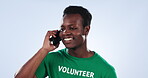 Black man, happy and volunteer phone call, talking or consulting for charity donation, pollution support or NGO help. Cellphone, waste management consultation and studio activist on blue background