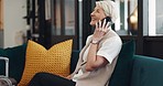 Phone call, travel and business woman in lobby for global networking, customer service and hospitality check, review or update. Smartphone, success and senior ceo or boss talking on sofa in a hotel