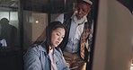Office, overtime and woman with manager at computer, coaching for worker on online project for digital marketing company. Teamwork, advice and support from management for girl working late at night.