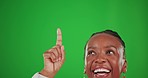 Happy, woman face and pointing on green screen, studio logo and mockup background. Closeup of black female advertising excited promotion, product placement or showing offer of information coming soon