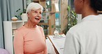 Healthcare, old woman and nutritionist in consultation in office, advice on food and wellness in clinic. Workout, diet and senior care results, elderly person and dietician with checklist for help.
