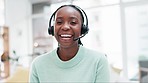 Happy black woman, call center and headphones in customer service, support or telemarketing at the office. Portrait of African female person smile in contact us for online advice or help at workplace