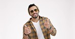 Fashion, thumbs up and man with sunglasses on a white background in trendy clothes, style and outfit. Happy, emoji and portrait of person with hand gesture for thank you, yes and agreement in studio