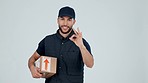 Delivery man, pointing at supplier list and package, OK with service information and advertising on white background. Box, supply chain and e commerce with courier choice and distribution in studio