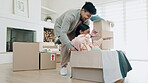 Couple, pushing box and playing in new home or celebrate moving into real estate property. A happy man and woman with fun energy and excited in their first house with mortgage, boxes and investment 