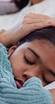 Care, mother and a sleeping child with comfort, relax and bonding at night in a house. Closeup, family and a hand of a parent rubbing a girl kid for dreaming, head rest or together for a nap