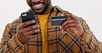 Hands, credit card and phone in studio for online shopping, digital payment and fintech account on white background. Closeup of happy man, mobile banking and password for ecommerce, sales and finance