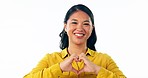 Happy asian woman, face and heart hands for love, trust or support in care against a studio background. Portrait of female person smile in happiness with romantic gesture, emoji or shape on mockup