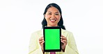 Happy asian woman, tablet and green screen in advertising or marketing against a studio background. Portrait of female person smile showing technology app, display or advertisement on mockup space