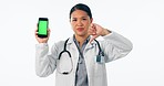 Face, doctor and thumbs down to green screen of phone for healthcare mistake, bad advice or fake news in studio. Portrait, asian woman or medical worker voting no to mobile mockup on white background