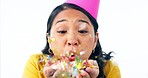 Party, celebration and face of woman blowing confetti in studio for happy birthday, well done or good job on white background. Success, congratulations and Asian model with event, decorations or fun