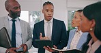 Collaboration, tablet and a business man planning with his team in the office for company growth. Teamwork, brainstorming or explain with an employee group talking in the workplace for strategy