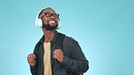 Walking, studio or student in headphones for music with smile or scholarship on blue background. Bag, university or happy black man excited by school education or college while streaming a radio song