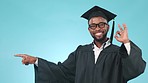 Pointing, pride and face of man graduate in a studio with mockup space for marketing or advertising. Happy, smile and African male university student with an ok gesture isolated by blue background.