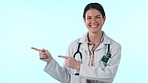 Studio doctor, healthcare and happy woman point at medical information, pharmacy commercial or medicine info. Mockup space, portrait and pharmacist direction at clinic presentation on blue background