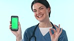 Green screen phone, happy woman and nurse ok, point and medicine brand info, mockup UI space or mobile clinic app. Cellphone, doctor portrait or surgeon okay, voting or agreement on studio background