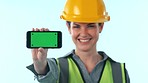 Studio, happy woman or engineer with mobile green screen for engineering news or construction advertising. Contractor, project notification or phone with architecture mockup space on blue background