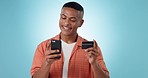 Happy man, phone and credit card for banking, payment or online shopping against a studio background. Male person or shopper smile with mobile smartphone for bank app, debit or ecommerce on mockup