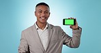 Green screen phone, smile and business man with online sales discount, web promotion or media service. Smartphone, corporate announcement and studio portrait with mockup UI space on blue background