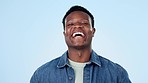 Happy, wink and face of black man laughing in studio for funny, comic or good mood on blue background. Emoji, portrait and African male model with humor, comedy and positive mindset or fun attitude 