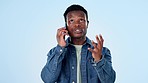 Phone call, stress and angry black man talking in studio isolated on blue background mockup space, Smartphone, conversation or frustrated person shouting, listening to argument or complaint on mobile