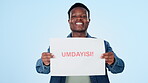 Smile, poster and sale with a black man on a blue background in studio for retail shopping. Portrait, smile and sign for a deal, discount or bargain with a happy young person holding paper info