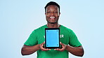 Man, volunteering and tablet mockup or screen for website, presentation or donation information in studio. Face of African person or NGO speaker for digital space, tracking marker and blue background