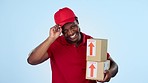 Boxes delivery, greeting or happy man in studio for logistics courier service, product shipping or agreement. Package distribution, head nod or face of an African person on blue background for cargo