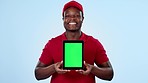 Delivery guy, green screen or black man with tablet in studio for ecommerce to track online shopping. Smile, face or happy courier talking about mockup space for stock distribution on blue background