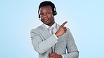 Pointing, presentation and a black man with call center advice or telemarketing help. Smile, customer service employee and a gesture while talking for online support or sale on a studio background