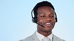 Call center, studio or virtual assistant in communication, speaking or talking to help in customer services. Blue background, black man or face of a happy African financial advisor with microphone