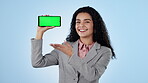 Business woman, phone and green screen in studio for join us, we are hiring and presentation of job search engine. Excited face of human resources worker for mobile app or sign up on blue background 