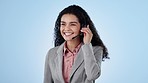 Call center, woman or smile in studio for customer service, CRM questions or communication of IT support on blue background. Telemarketing agent, virtual consultant or microphone for telecom advisory