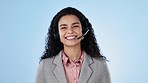 Call center, woman and face in studio for customer service, CRM questions and IT communication on blue background. Portrait, happy telemarketing agent and virtual assistant with microphone for advice