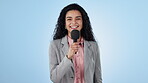 Woman, presenter and news in studio for interview, questions or speaker on blue background with smile. Professional, person and journalist for speaker, broadcast and tv show with microphone on mockup