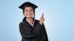 Graduate, university and face of woman with hand pointing in studio for sign up, study or checklist on blue background. Education, presentation and portrait of lady student show timeline, faq or info
